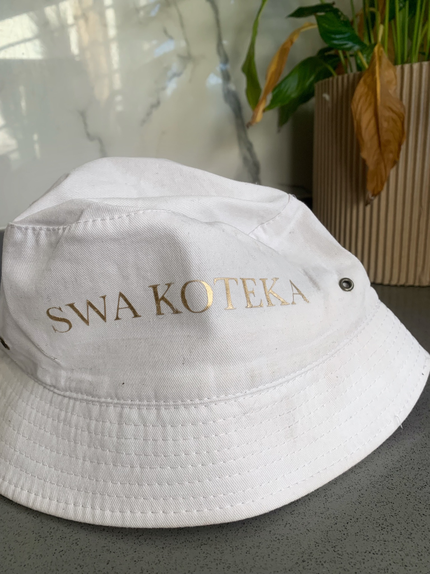 White Swa Koteka Bucket Hat